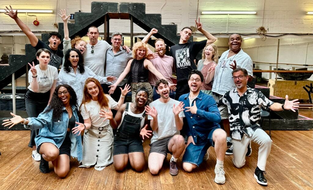 The cast of The Addams Family UK Tour in rehearsals